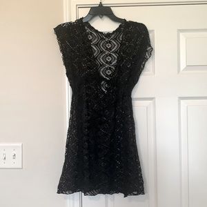 Black swim cover-up. Net material/see-through. Size: small Brand: Becca
